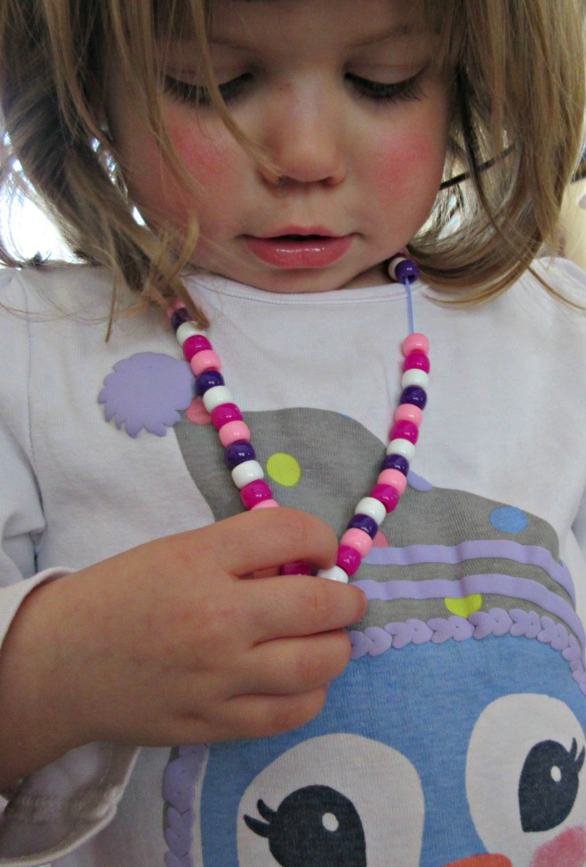 making a necklace activities for toddlers