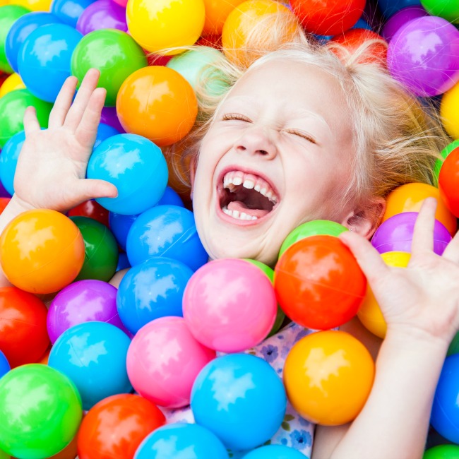 girl in ball pit