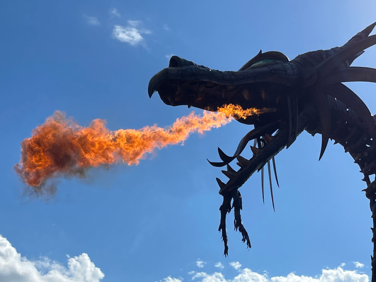 magic kingdom dragon float breathing fire